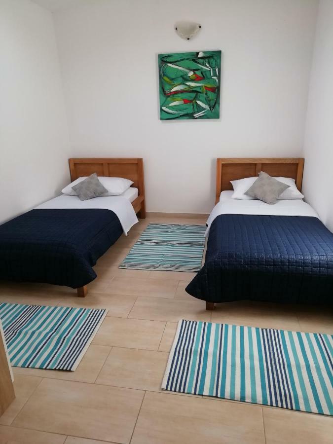 Poseidon Holiday Guesthouse Жирье Экстерьер фото